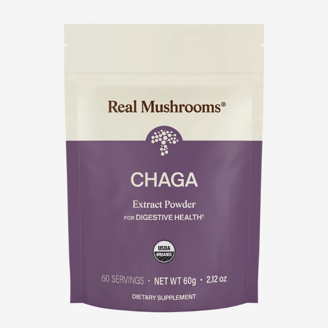 A pouch labeled Real Mushrooms | Organic Siberian Chaga Extract Powder – 60g, USDA organic, 60 servings. The cream and purple pack delivers potent chaga mushroom extract rich in beta-glucans for digestive health.
