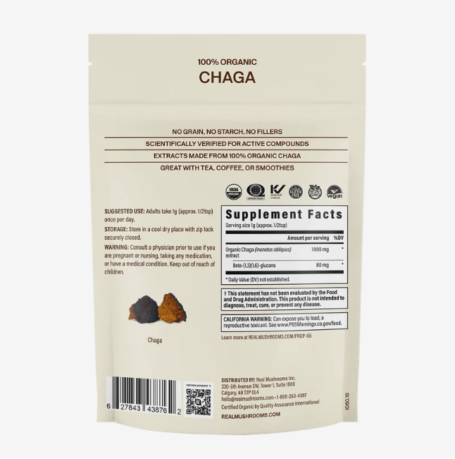 Back view of a beige package labeled Real Mushrooms | Organic Siberian Chaga Extract Powder – 60g, showing supplement facts, usage instructions, beta-glucans info, and certification details.