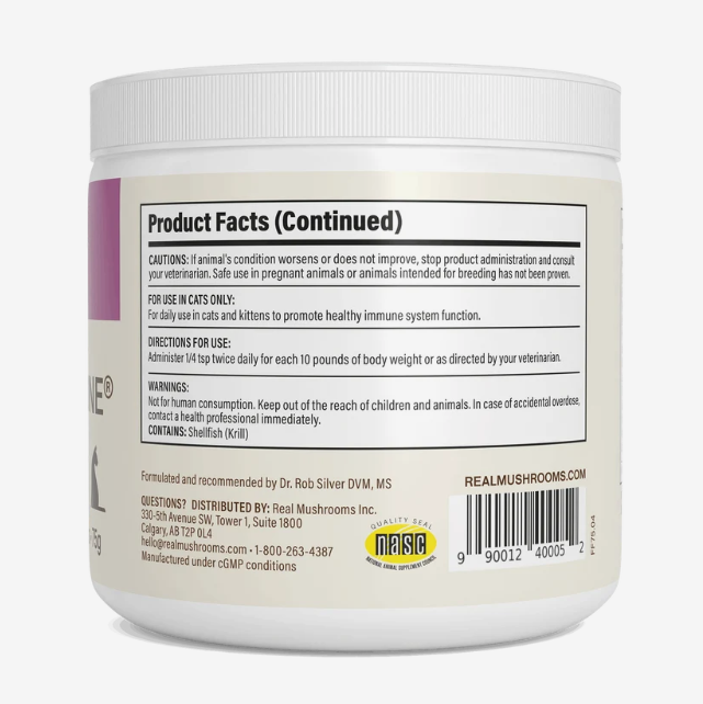 A white container labeled with product facts, cautions, directions for use, and company contact information displays a barcode and website. Black text appears on a white background. Real Mushrooms | Functional Feline Powder is a mushroom supplement designed to support your cat’s immune health with every serving.