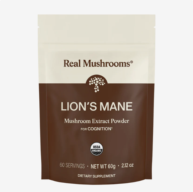 A brown and beige pouch labeled “Real Mushrooms Organic Lions Mane Mushroom Powder – 60g,” indicating it is USDA Organic, provides 60 servings (net weight 60g / 2.12 oz), and serves as a dietary supplement formulated for cognition support. This organic powder delivers brain function support in every serving.