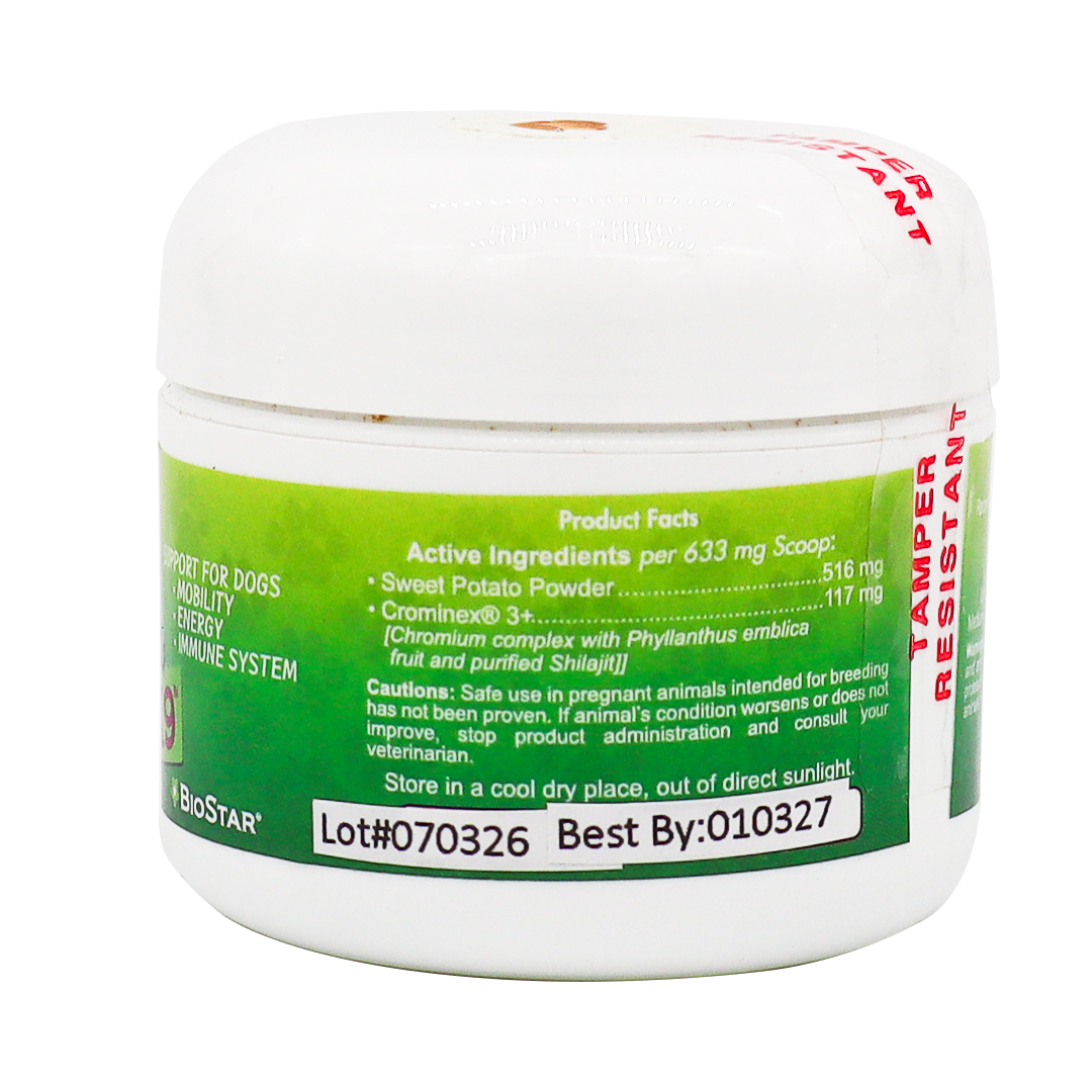 A white plastic container labeled “Biostar Garden Juvenate K9,” featuring a green and white design that displays supplement facts, caution information, lot number, best by date, and storage directions for a dog supplement.