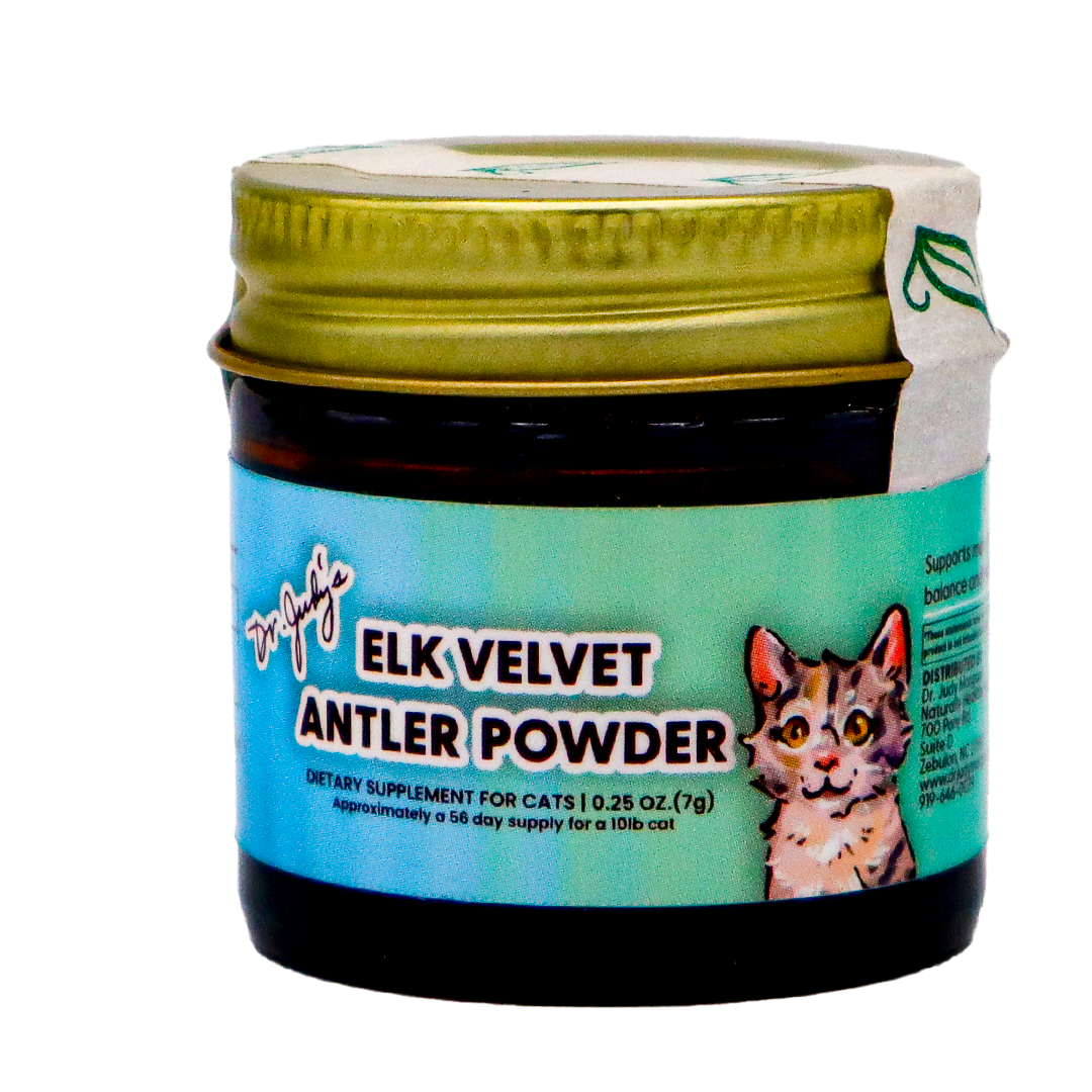 A small 7g jar of Dr. Judy's Elk Velvet Antler Powder for Cats, featuring a green lid and an illustrated cat on the label. This dietary supplement is formulated to provide natural joint support for cats and contains IGF-1 to promote overall feline health and mobility.