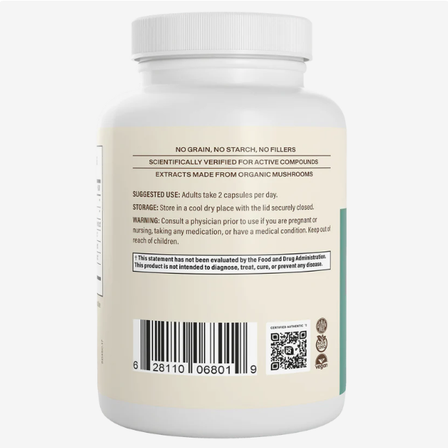 A white supplement bottle labeled with usage instructions, a barcode, and warnings. The text indicates it contains Real Mushrooms | 5 Defenders™ Organic Mushroom Blend Capsules for Humans (90 count), formulated for immune support, and advises taking two capsules daily.