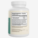 A white bottle of Real Mushrooms | 5 Defenders™ Organic Mushroom Blend Capsules for Humans (90 count) displays a Supplement Facts label for an extract blend containing functional mushrooms such as turkey tail, maitake, reishi, shiitake, and chaga. Each serving size is 2 capsules and is formulated to support immune health.