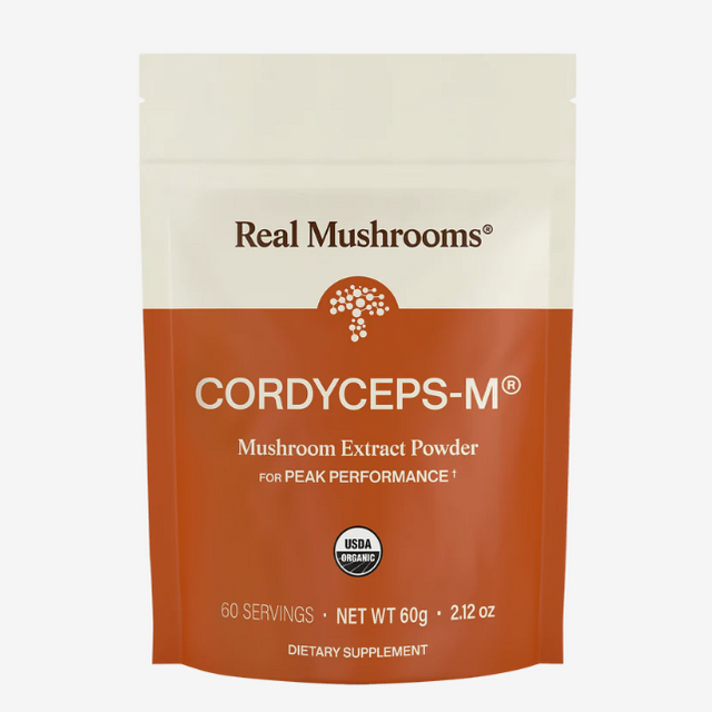 Real Mushrooms | Organic Cordyceps Mushroom Powder – 60g features USDA organic mushroom powder rich in beta-glucans, providing 60 servings in a white and orange package, designed as a dietary supplement for peak performance.