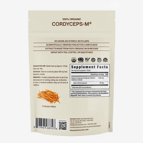 Back of a Real Mushrooms | Organic Cordyceps Mushroom Powder - 60g beige pouch, displaying usage directions, supplement facts highlighting beta-glucans content, a description featuring cordyceps mushroom extract and organic mushroom powder, warnings, barcode, an image of cordyceps mushrooms, and manufacturer details.