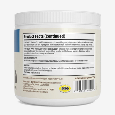 A white container featuring a label with product facts, usage instructions, manufacturer details, and warnings for Real Mushrooms | Daily Dawg Powder for Dogs, an organic mushroom supplement. The packaging also displays the barcode and website information. Immune support benefits for dogs are clearly highlighted on the container.