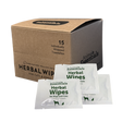 A brown box labeled Animal Essentials | Herbal Wipes (15 count box) sits with three individual white towelette packets displayed in front. Designed for natural grooming, the box notes it contains 15 individually wrapped herbal pet wipes for cats and dogs.