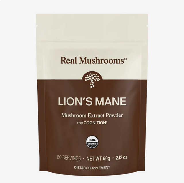 A brown and beige pouch labeled “Real Mushrooms Organic Lions Mane Mushroom Powder – 60g,” indicating it is USDA Organic, provides 60 servings (net weight 60g / 2.12 oz), and serves as a dietary supplement formulated for cognition support. This organic powder delivers brain function support in every serving.