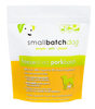 A bag of SmallBatch Freeze-Dried Complete Recipes for Dogs - Sliders, in white and green packaging with orange accents, highlights humane pork, non-GMO veggies, and essential nutrition for your dog.