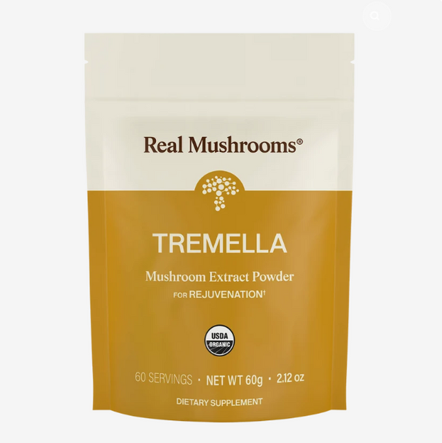 A yellow and white pouch labeled “Real Mushrooms | Organic Tremella Extract Powder – 60g” highlights its rejuvenation benefits, features 60 servings, is USDA Organic certified, and serves as a dietary supplement made with premium organic mushroom extract rich in beta-glucans for optimal wellness.
