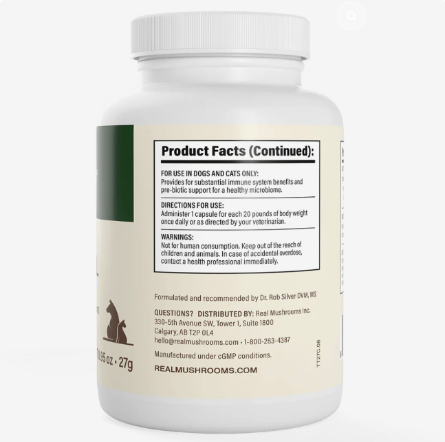 A white bottle of Real Mushrooms | Organic Turkey Tail Capsules - 90 Count for dogs and cats, featuring animal silhouettes at the bottom left. The label displays product facts, dosage directions, warnings, and highlights clearly marked beta-glucans content to support your pet’s wellness. Contact information for Real Mushrooms Inc. and manufacturing details are also included.