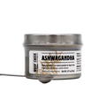 A small silver tin of Woof Creek | Ashwagandha Root Extract Powder for Dogs + Cats, labeled accordingly, contains root extract powder designed to provide natural stress relief for dogs and cats. A metal spoon filled with the powder is placed in front of the tin on a white background.