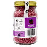 Project Sudz | Berry Boost Urinary Support for Dogs and Cats – 210g comes in a glass jar with a gold lid, containing pink bath soak infused with nourishing cranberry and other botanical ingredients. The labels indicate it’s cruelty-free, plastic-free, vegan, rich in antioxidants, hand-mixed in the USA, and feature the website projectsudz.com.