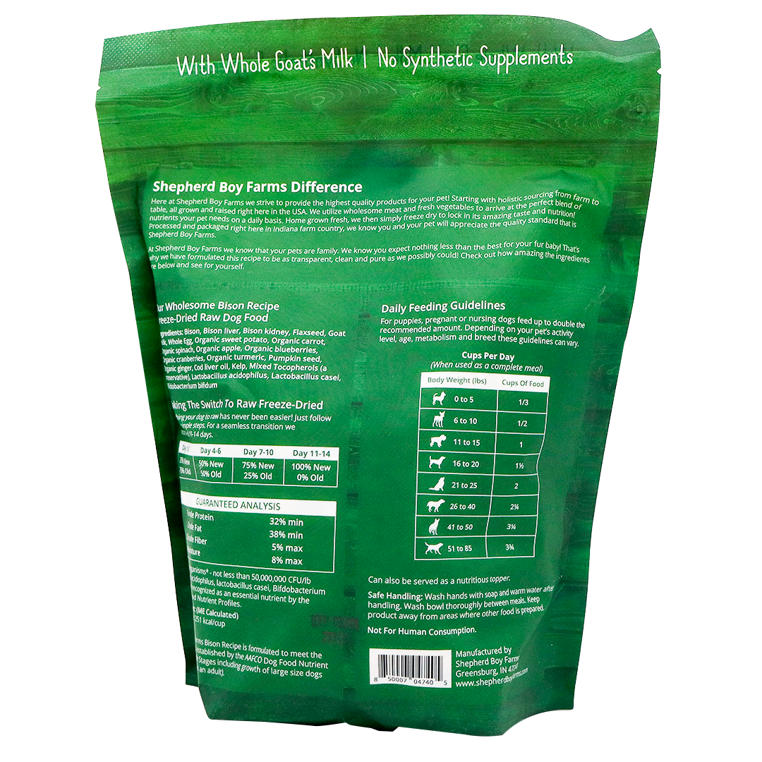 Back of a green Shepherd Boy Farms Freeze-Dried Bison Recipe - 14oz dog food bag showing product info, feeding guidelines by weight, ingredients, nutrition analysis, and "With Whole Goats Milk | No Synthetic Supplements" at the top.