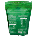 Back of a green Shepherd Boy Farms Freeze-Dried Bison Recipe - 14oz dog food bag showing product info, feeding guidelines by weight, ingredients, nutrition analysis, and "With Whole Goats Milk | No Synthetic Supplements" at the top.