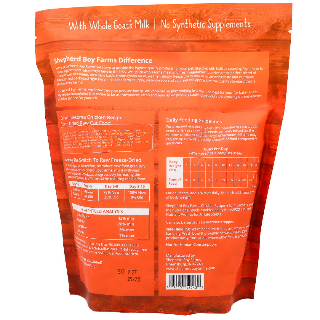 Back of a Shepherd Boy Farms | Chicken Recipe for Cats - 14oz package showing feeding guidelines, nutritional information, ingredients, and product details; the text highlights it contains whole goats milk and no synthetic supplements. Perfect for pet owners seeking freeze-dried cat food options, this product offers natural nutrition in a primarily orange package.