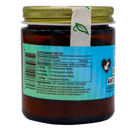 Dr. Judy's Elk Velvet Antler Powder - 30g comes in a brown jar with a gold lid, featuring a blue label that displays supplement facts and dosage instructions. The product is known for its IGF-1 content and provides joint support for dogs and cats. A small leaf-patterned seal crosses both the lid and the label.