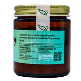Dr. Judy's Elk Velvet Antler Powder - 30g comes in a brown glass jar with a gold lid and a teal label. The label highlights its musculoskeletal health benefits for dogs and cats, featuring two green leaf icons, a QR code, and details about distribution and manufacturing. Key ingredients include elk velvet antler powder for joint support.