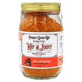 A glass jar with a gold lid containing orange flakes labeled Project Sudz | Hip & Joint Support for Dogs and Cats - 210g, featuring an advanced hip and joint formula with organic turmeric and ginger to support pet mobility.