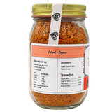 Project Sudz | Hip & Joint Support for Dogs and Cats - 210g comes in a glass jar with a gold lid, filled with orange flakes. The label features ingredients (coconut, turmeric, ginger), nutrition facts, and directions for pet use. Prominently marked as Natural & Organic, this hip & joint formula harnesses the power of turmeric to help support overall mobility in dogs and cats.
