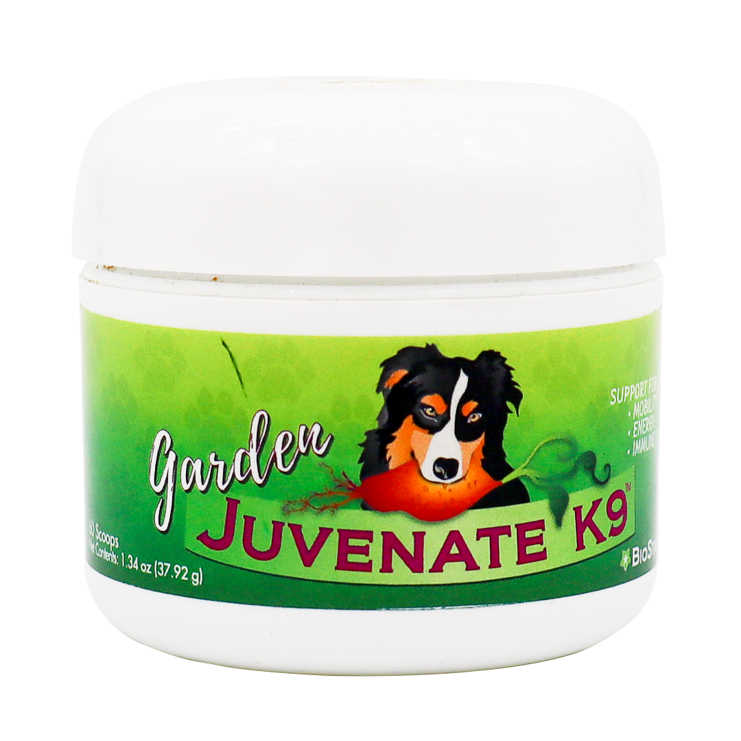 A white container labeled Biostar Garden Juvenate K9, featuring an illustration of a dog on a green background. The label highlights support for digestion, immunity, and energy in dogs.