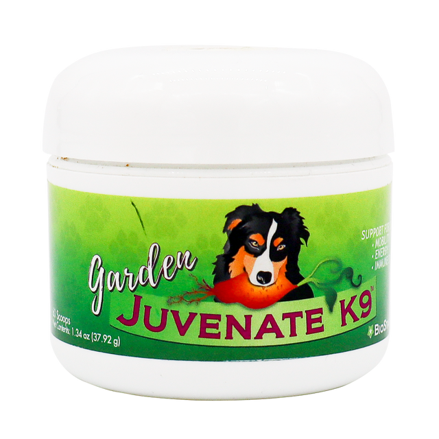 A white container labeled Biostar Garden Juvenate K9, featuring an illustration of a dog on a green background. The label highlights support for digestion, immunity, and energy in dogs.