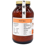 A large glass jar with a gold lid contains Project Sudz | Pumpkin Boost Digestive Health for Dogs and Cats - 210g, featuring a reddish-brown dried blend formulated to support pet digestive health. The label displays ingredients, directions, and nutrition facts, highlighting beneficial additions like slippery elm and soil-based probiotics. A white seal marked with black logos runs from the lid down the side of the jar.