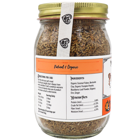 A glass jar with a gold lid contains Project Sudz | Pumpkin Rx GI Support for Dogs - 220g, a brown flaky product formulated to support healthy gut function in dogs. The label displays ingredients, nutrition facts, and directions for use and features “Natural & Organic” in orange text on the front.