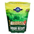 A green and yellow bag of Shepherd Boy Farms Freeze-Dried Bison Recipe (14oz) dog food, featuring a natural landscape with animals and trees. This grain-free recipe includes goat’s milk, no synthetic supplements, and is AAFCO approved.