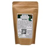 A 4oz stand-up pouch of Solutions Pet Products | Biome - 4oz gut microbiome supplement. The label shows a logo, wooden spoon with green powder, ingredients, QR code, and Packed On 8/29/26 stamp.