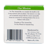 The back of The Animal Bar | Soothing Salve for Dogs & Cats - 2oz box features the brand’s mission statement about caring for animals and the planet, along with the founders’ names, a barcode, and contact information for the company in The Woodlands, TX.