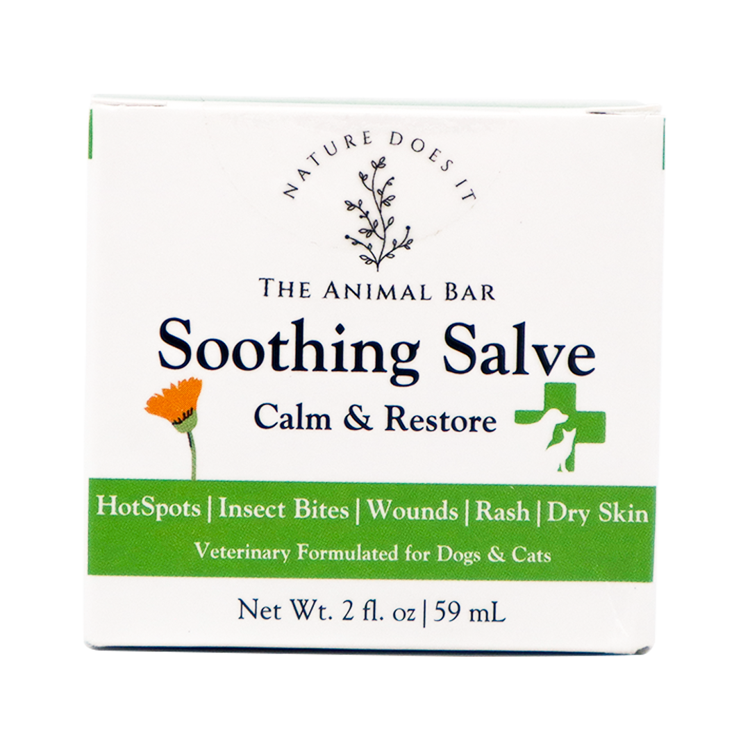 A 2oz box of The Animal Bar | Soothing Salve for Dogs & Cats, formulated to calm and restore. Ideal for use on hotspots, insect bites, wounds, rashes, and dry skin. Net weight: 2 fl. oz. (59 mL).