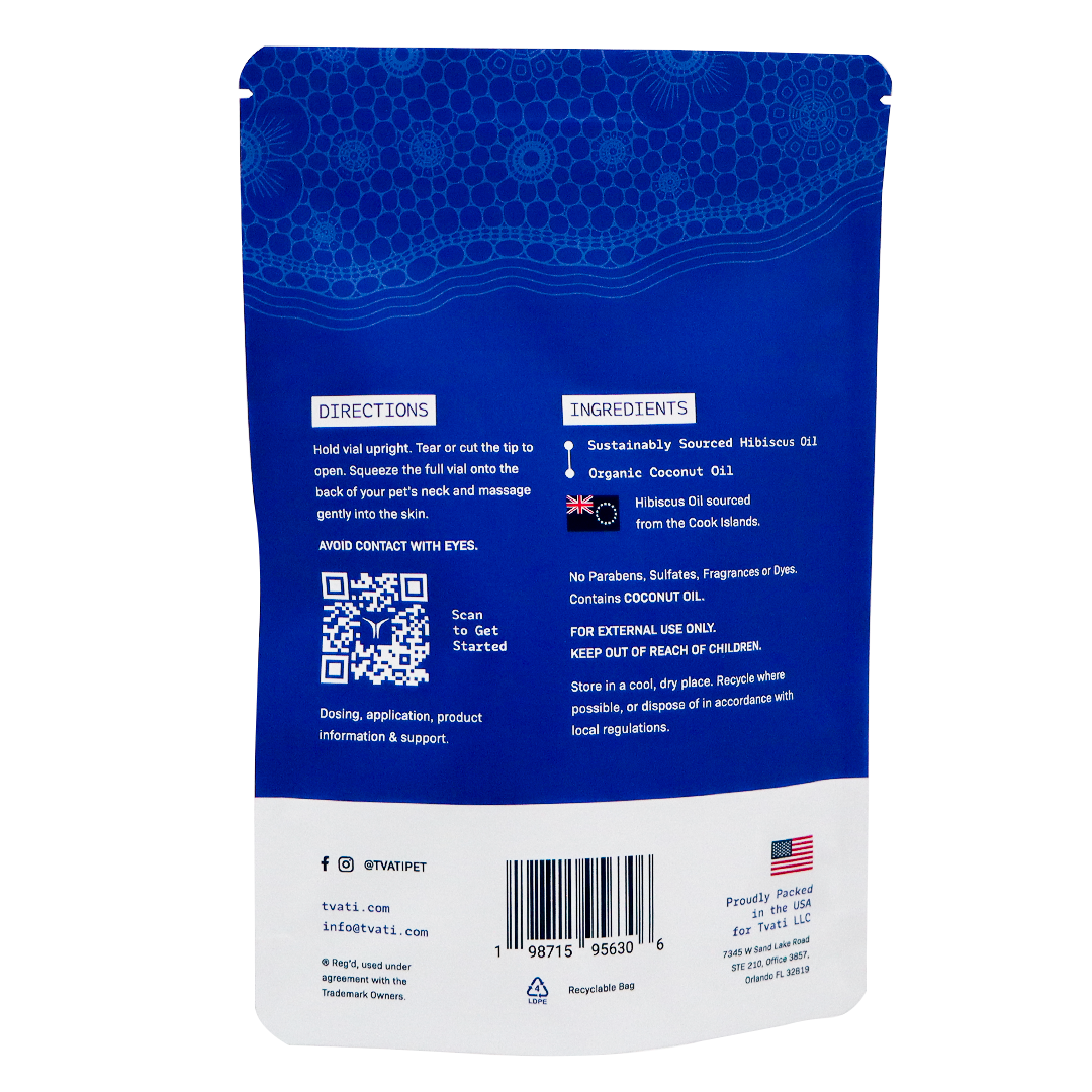 The back of a blue, flat-bottomed pouch for Tvati | Advanced Pet Mobility Formula, showing directions, an ingredients list featuring hibiscus and coconut oil, a QR code, a barcode, and company contact information for pet mobility support.