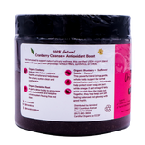 A dark jar labeled “kin+kind Urinary Tract with Antioxidant Boost” features a pink and white design, showcasing details about its USDA organic ingredients, urinary tract health benefits, and company contact information. The label also emphasizes its blend of powerful superfoods formulated as pet supplements.