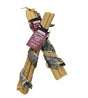 Two Icelandic+ Collagen Dental Chews for dogs, each featuring a gray, spiral-wrapped fish skin for texture and taste—providing an omega-3 treat your pet will love.